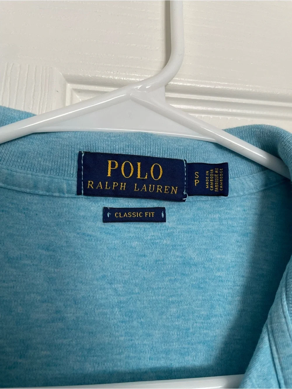 Polo by Ralph Lauren 100% Cotton Men’s size Small Light Blue Polo w Yellow Logo